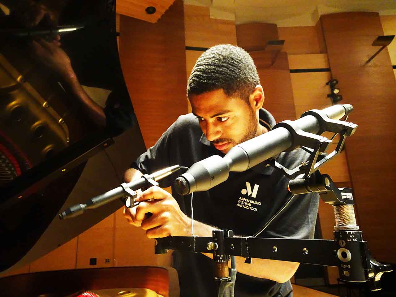 Johnathan Smith miking a grand piano with a pair of Sanken CO-100K microphones